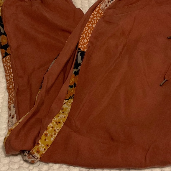 Super soft deep mauve jogger style pants with bohemian fabric side strips - Picture 3 of 8